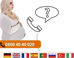 Abbildung einer schwangeren Frau mit der Telefonnummer für internationale Hilfetelefone: 0800 40 40 020